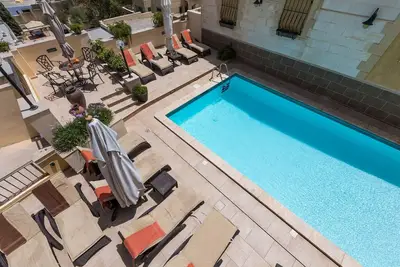 Image de Villa Margherita Unit 1, with a large Pool, patio, and spacious outside spaces.