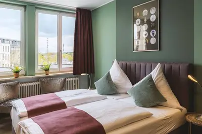 Image de Four-bed room LouM - Hotel Louis Müller