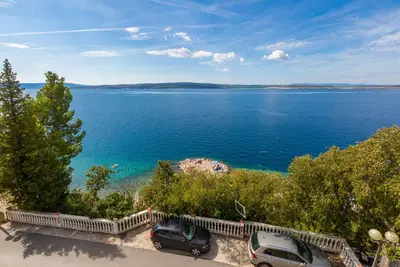 Image de Appartement de vacances avec air conditionné et vue sur la mer