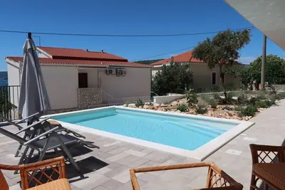 Image de Confortable appartement avec piscine, Wifi, climatisation, Tv, terrasse, animaux admis et parking
