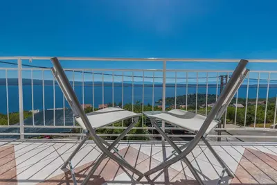Image de Appartement de vacances avec vue sur la mer et air conditionné