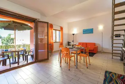 Image de Maison de vacances 'Sardegna il Corbezzolo' avec Wi-Fi et terrasse