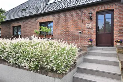 Image de Reihenferienhaus mit Kamin und Terrasse im Ostseeland Ofc 11 - 3- Raum Ferienhaus mit Terrasse und