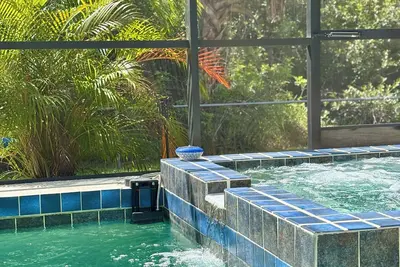 Image de 🩵Salty Shark Retreat 🩵 Heated Pool/Spa 🩵Nearby Beaches, Golf Courses! ! !
