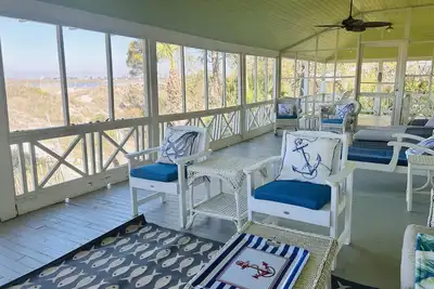 Image de Large, Classic Beachfront House with Wrap-Around Porch by Tybee Cottages