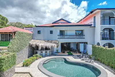 Image de Beachfront home in paradise with a private pool overlooking the Pacific Ocean.