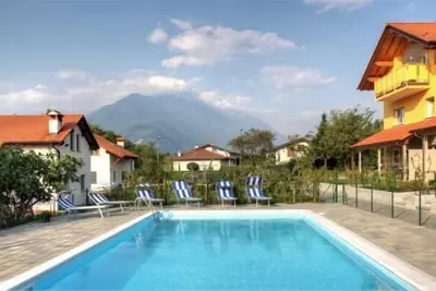 Image de 2 room apartment with terrace, garden, pool, slide, swing and sandpit