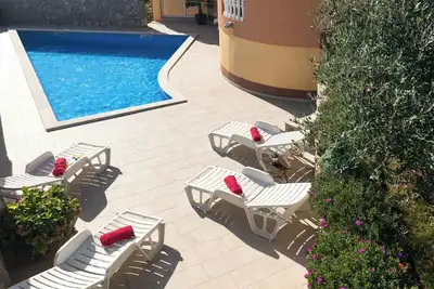 Image de Appartement de vacances avec piscine partagée