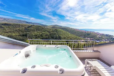 Image de Appartement de vacances avec vue sur la mer et air conditionné