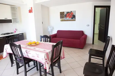 Image de Suite Suite with 2 bedrooms and one bedroom with 2 single beds