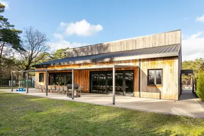 Image de Maison sur le terrain d'un parc de vacances