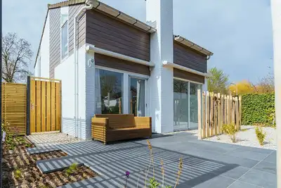 Image de Maison de vacances décorée avec goût avec un aspect moderne et léger qui a été décorée avec amour et soin.