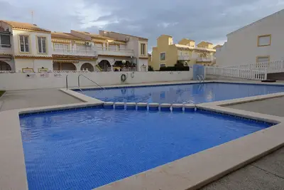 3 Bed first floor Apartment, communal pool and sea views, wifi.