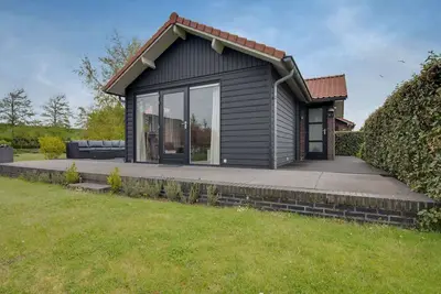 Image de Maison de vacances א Kattendijke avec jardin