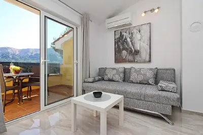 Image de Appartement de vacances Baška pour 1 - 4 personnes avec 2 chambres à coucher - Maison de vacances