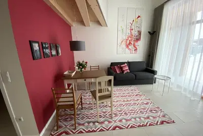 Image de Vacation apartment in new wooden building with open kitchen