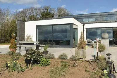Image de A stylish converted barn annex.