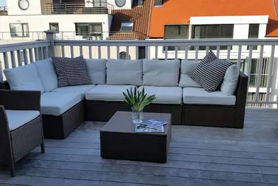 Image de Spacious Bright duplex penthouse with 2 large terraces within walking distance from the sea