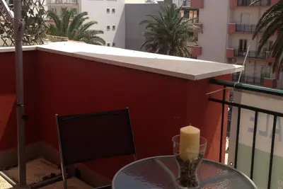 Image de Penthouse in the town's pricipal square. Close to the sea to the spa to shopping