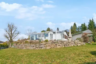 Image de Ferienhaus Auf dem Sand