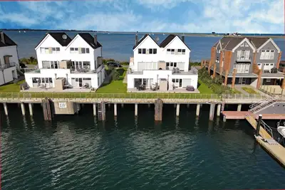Image de 3-room apartment Brigantine 33 by Seeblick Ferien Oro, water view, sauna