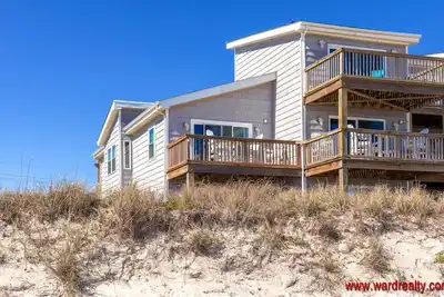 Image de Slow M'Ocean - Beautiful 2 Br Oceanfront Townhome!