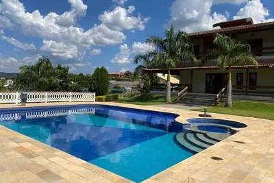Image de Chacara with large heated swimming pool and synthetic grass soccer pitch