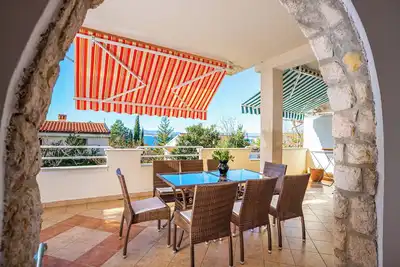 Image de Appartement de vacances avec vue sur la mer et air conditionné