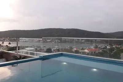 Image de Flat Aconchegante no EdifĂcio Royale Cabo Frio- Praia do Forte