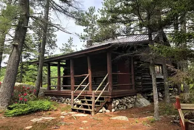 Image de Small private Island on scenic Maine pond with charming authentic log cabin.