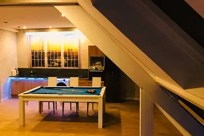 Image de Le Loft de Zoé 90m² - Jacuzzi Billard Cinéma & Bar