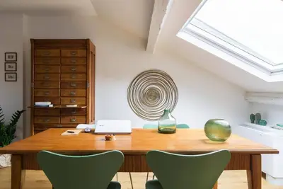 Image de It is a newly renovated attic located in a building from the early 1900s