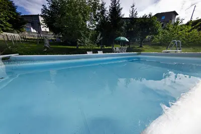 Image de Bel appartement avec Wifi, piscine privée, Tv, patio, animaux admis, vue panoramique et parking