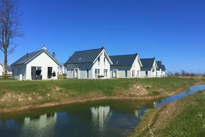 Image de Vacation home Skipper Hus by Seeblick Ferien Oro, fireplace, sauna