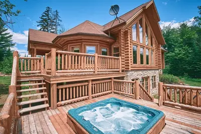 Image de Duc #83 - chalet de bois rond avec spa, sauna et piscine privée