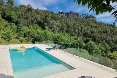 Image de 6-bedroom vacation home with pool, playground and barbecue area