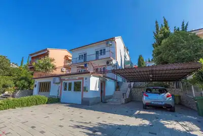 Image de Appartement de vacances avec air conditionné et vue sur la mer