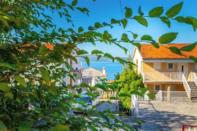 Image de Appartement de vacances avec vue sur la mer et air conditionné