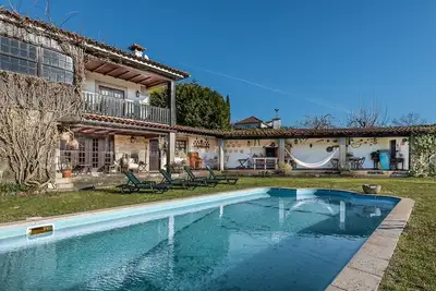 Image de GuestReady - Casa das Alminhas