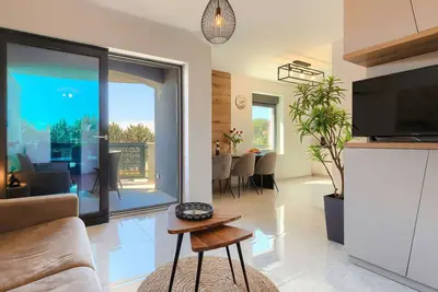 Image de Confortable appartement pour 4 personnes avec climatisation, Wifi, Tv, terrasse et parking