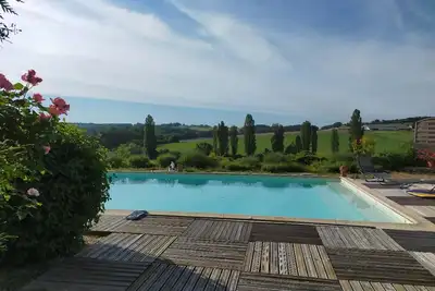 Image de Maison de campagne avec piscine, proche de Périgueux – 2 chambres, Bbq, activités variées à proximité