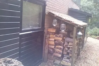 Image de Knus Huisje in het bos