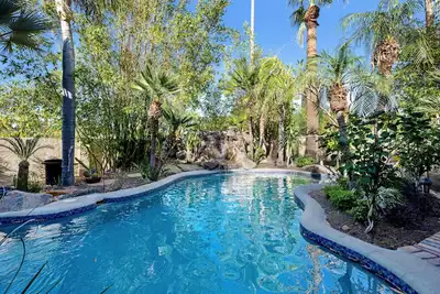 1920's mansion with private pool, theater room & central location