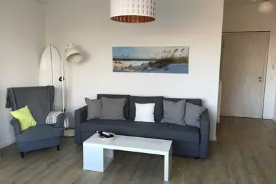 Image de Moderne Strandnahe Ferienwohnung TĂĽmmler