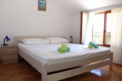 Image de Appartement de vacances Podgora pour 1 - 4 personnes avec 1 chambre Ă coucher - Maison de vacances