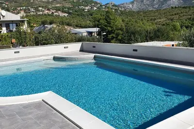 Image de Apartments Villa Salona Sky - Deluxe One Bedroom Apartment with Balcony