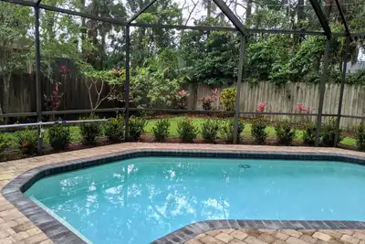 Image de Beautiful pool home, minutes away from famous beaches, 7 minutes to airport