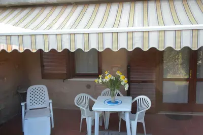 Appartement de vacances avec jardin privé dans un emplacement idéal au bord du lac