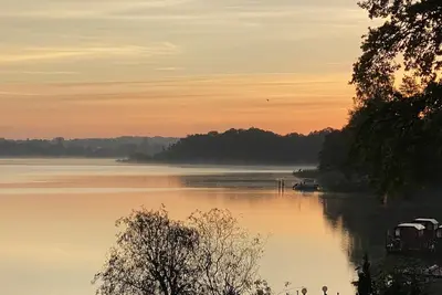Image de Havel view 137°- Holiday home with sauna, directly on the banks of the Havel, meadow and sandy beach