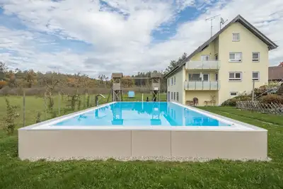 Image de Appartement \"Vergißmeinnicht\" à la ferme près du lac de Constance avec terrasse et piscine
